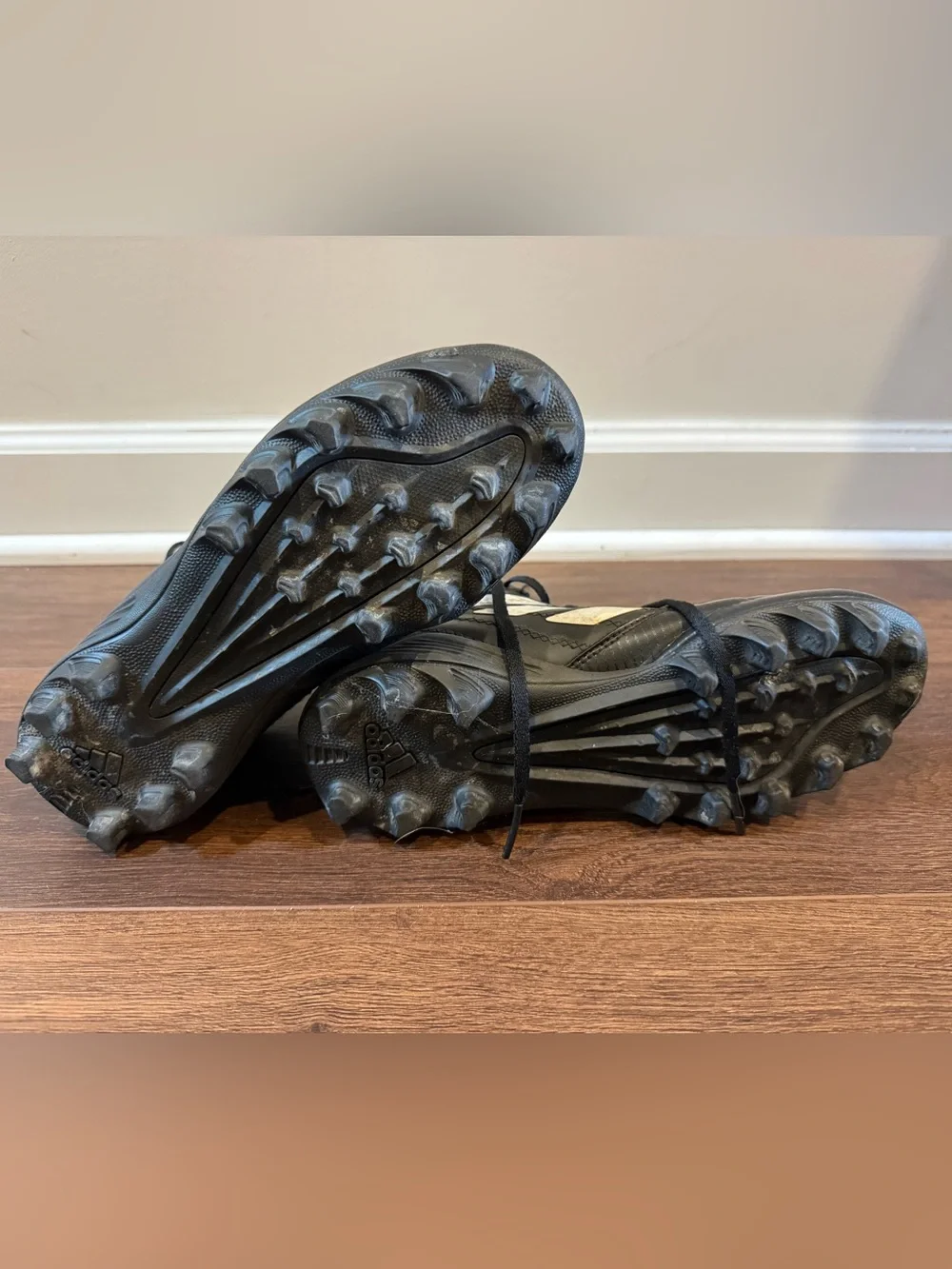 Adidas Black Football Cleats with White Stripes